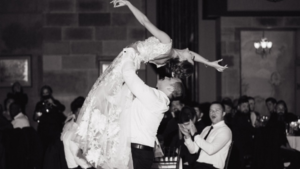 first dance lift during their wedding reception at The Society Room of Hartford, accompanied by live music from Shaded Soul Band.